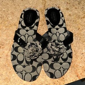 Coach Black and Cream Sandals with Floral Accent